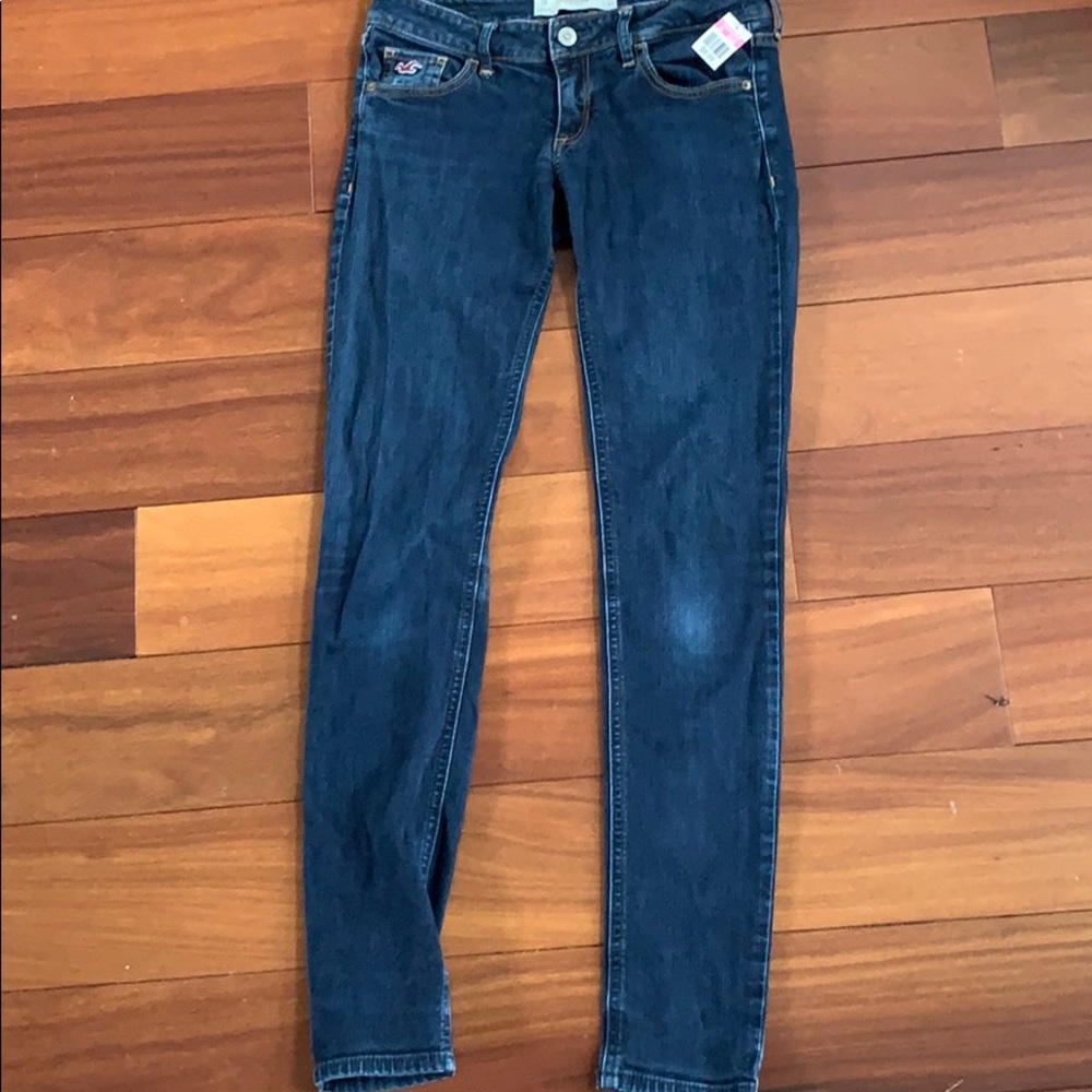 Hollister dark blue wash jeans.